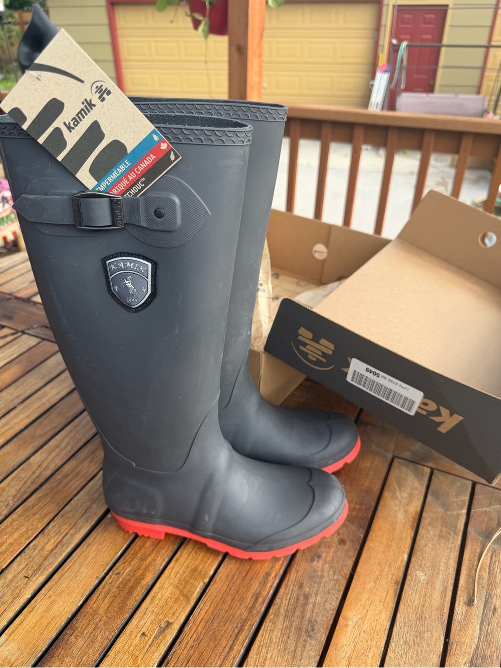 NWT- Kamik Women’s Black Rubber Rain Boots with Red Outsole